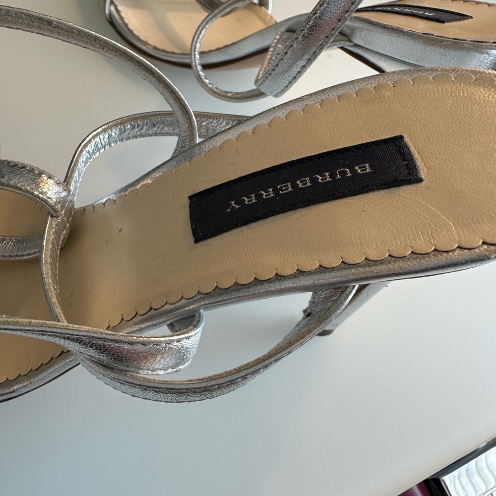 Like new silver Burberry Strap sandals with approx 3.5 inch heel